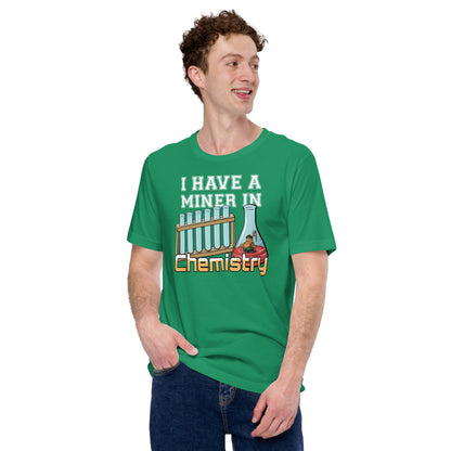 Man in kelly green Miner in Chemistry t-shirt